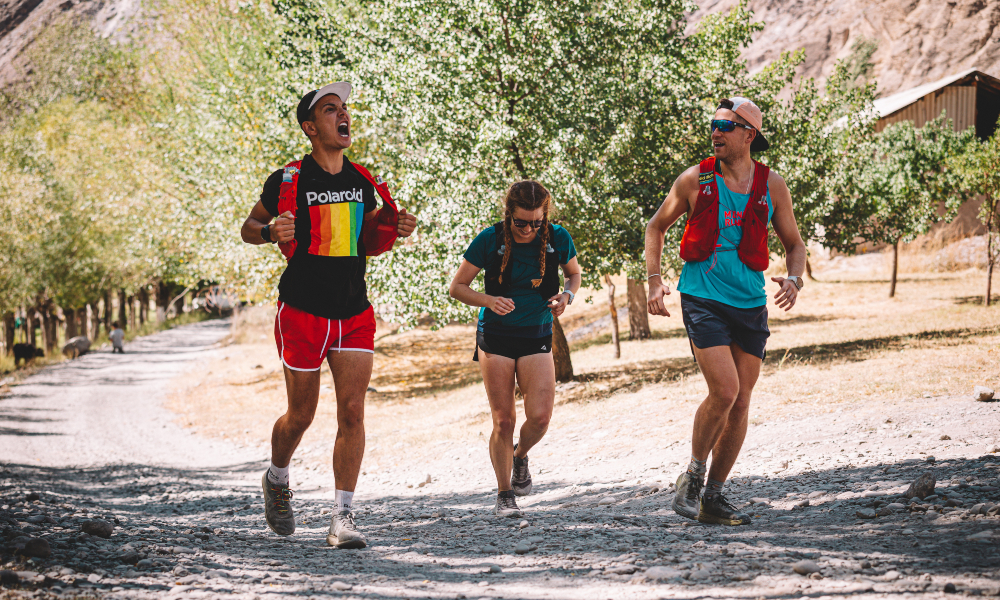 Three friends running and having fun