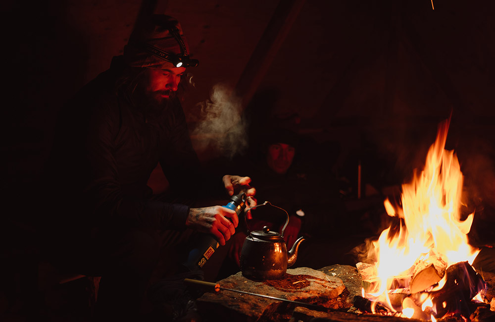 Warm by the fire at the wilderness hut